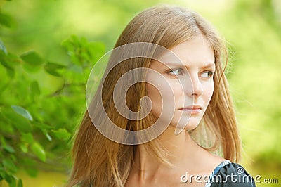 Young woman reflects Stock Photo