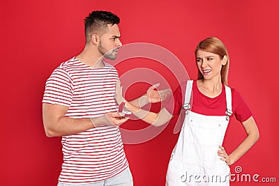 Young woman rejecting engagement ring from boyfriend on background Stock Photo