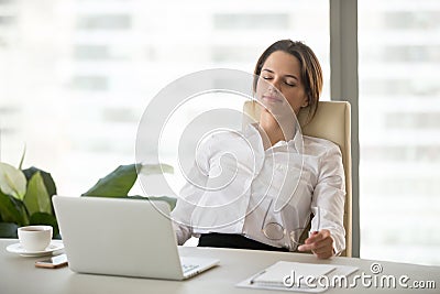 Young woman relaxing enjoying break on comfortable ergonomic off Stock Photo