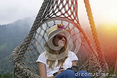 A young woman resting in a hammock in Pokut Plateau Stock Photo