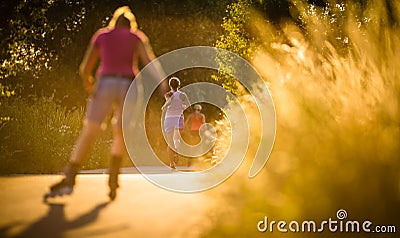 Young woman running outdoors on a lovely sunny summer evenis Stock Photo