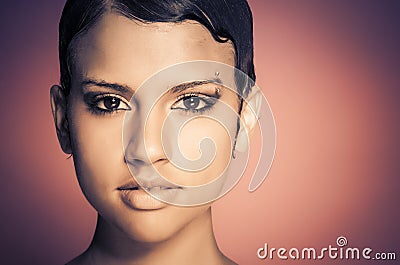 Young woman's face with short hair Stock Photo