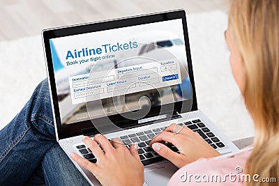 Woman Booking Online Air Ticket Stock Photo