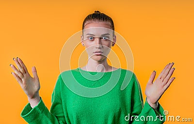 Young woman showing big invisible abstract subject, object sizes. Large, giant Stock Photo