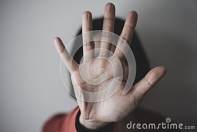 Young woman showing her denial with NO on her hand Stock Photo