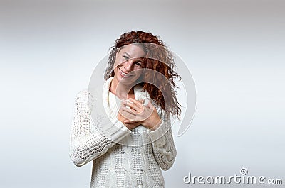 Young woman showing her heartfelt gratitude Stock Photo