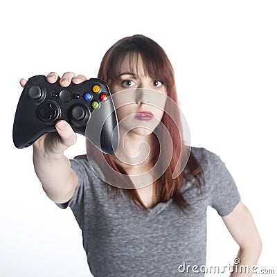 Young Woman Showing Video Game Joysticks Stock Photo