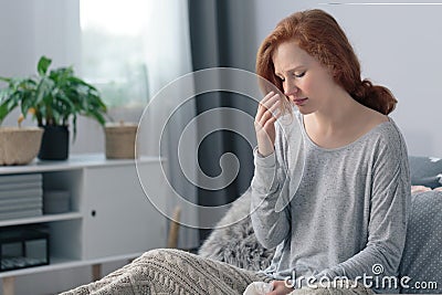 Sick woman with high fever Stock Photo