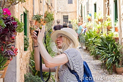 Young woman sightseeing and photographing Stock Photo