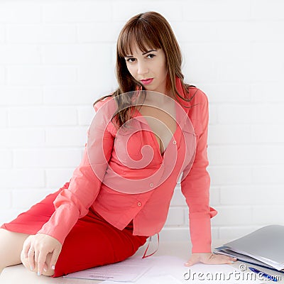 Young woman signs a loan agreement Stock Photo