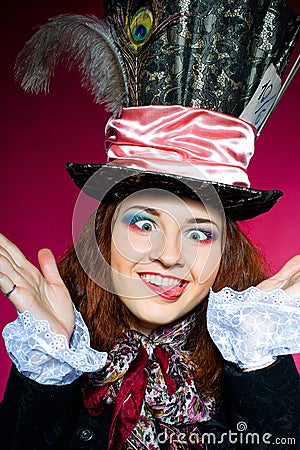 Young woman in the similitude of the Hatter Stock Photo