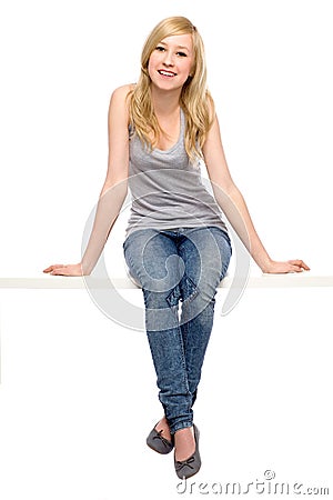 Young woman sitting Stock Photo