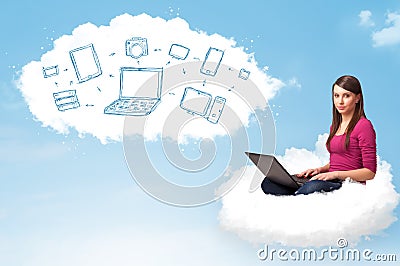 Young woman sitting in cloud with laptop Stock Photo