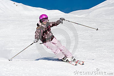 Young woman skiing Stock Photo