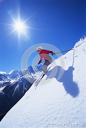 Young woman skiing Stock Photo