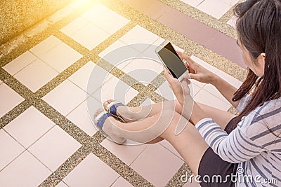 Young woman and smartphones Stock Photo