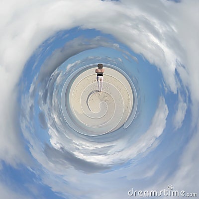 A young woman standing at the beach of a Maldivian island Stock Photo