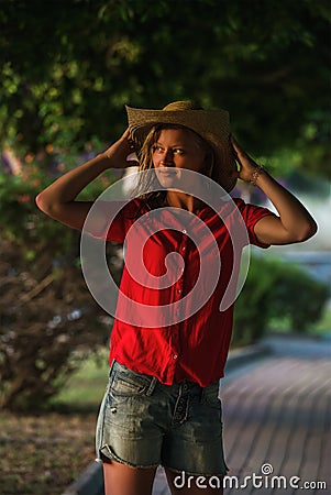 Young woman standing and looking aside, Alanya, Turkey Stock Photo