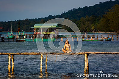Young woman on starfish beach Vietnam Stock Photo