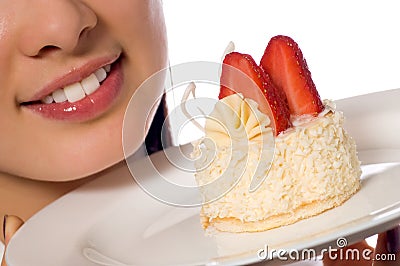 Young woman with strawberries cake Stock Photo