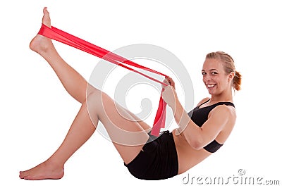 A young woman with a stretch band Stock Photo