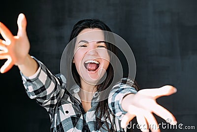 Young woman stretching arms happiness excitement Stock Photo