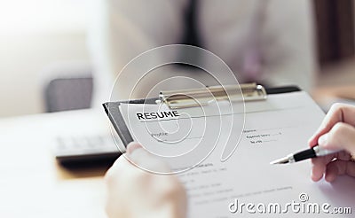 Young woman submit resume employer to review job application. Stock Photo