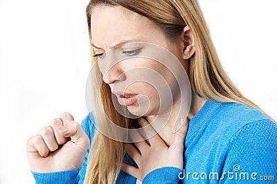 Young Woman Suffering With Cough Stock Photo
