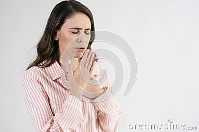 Young woman suffering from cough Stock Photo