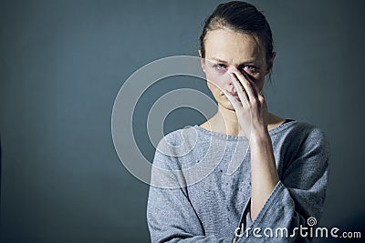 Young woman suffering from severe depression/anxiety/sadness Stock Photo