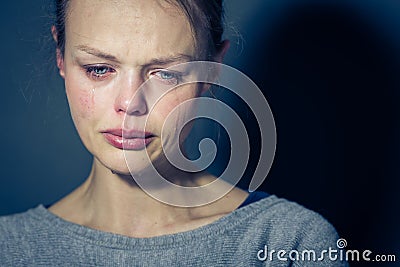 Young woman suffering from severe depression/anxiety/sadness Stock Photo