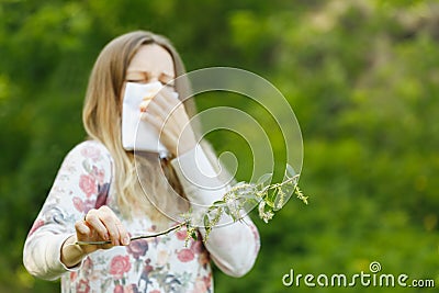 Young woman suffering spring pollen allergy Stock Photo