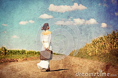Young woman with suitcase Stock Photo