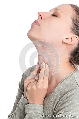 Young woman sweeping the laryngeal, laryngitis, goiter or hypothyreosis Stock Photo