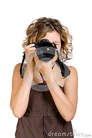 Young woman taking a photo with a camera Stock Photo
