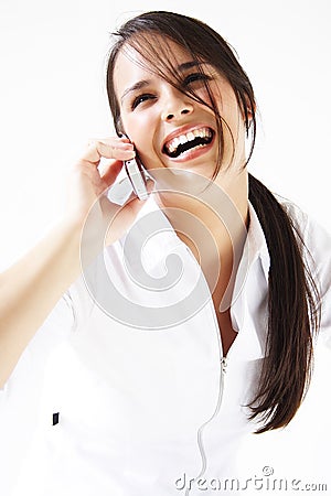 Young woman talks on cellphone Stock Photo