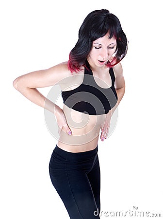 A young woman in terrible pain in back Stock Photo