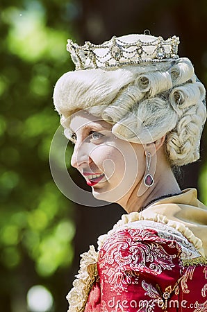 Young woman in 18th century suit. Editorial Stock Photo