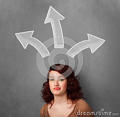 Young woman thinking with arrows above her head Stock Photo