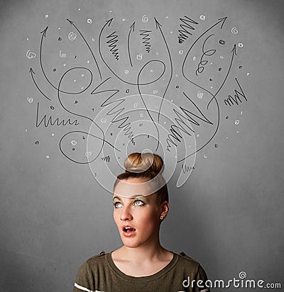 Young woman thinking with arrows over her head Stock Photo