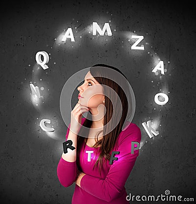 Young woman thinking with letter circulation around her head Stock Photo