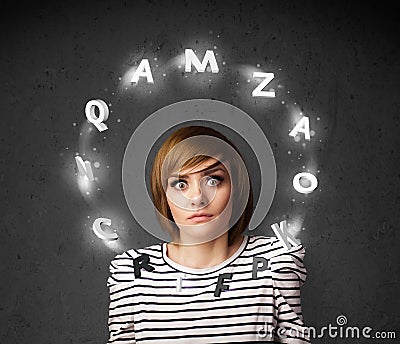 Young woman thinking with letter circulation around her head Stock Photo