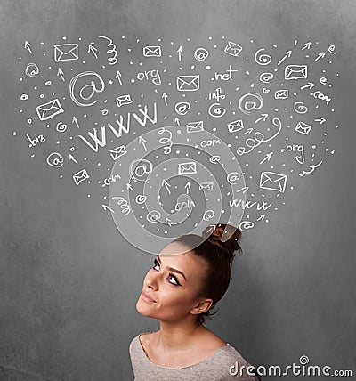 Young woman thinking with social network icons above her head Stock Photo