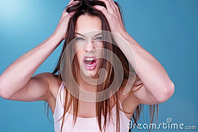 Young woman throwing a temper tantrum Stock Photo