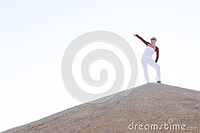 Young woman on top of the mountain Stock Photo