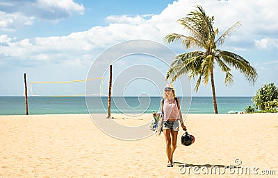 Young woman traveler walking on the beach in Phuket island Stock Photo