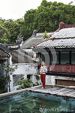 Young Woman Traveler Walking Concept Stock Photo