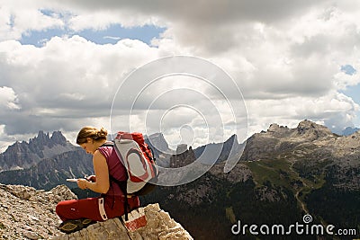 Young woman trekking Dolomite Stock Photo