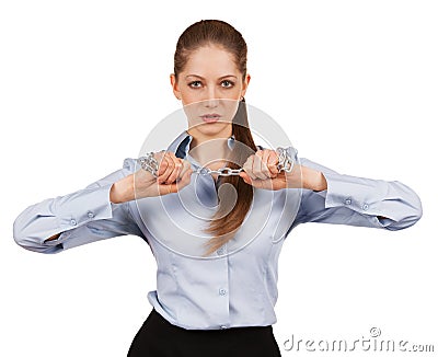 Young woman trying to break a metal chain Stock Photo
