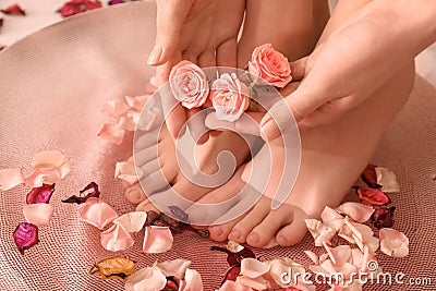 Young woman undergoing spa pedicure treatment in beauty salon, closeup Stock Photo